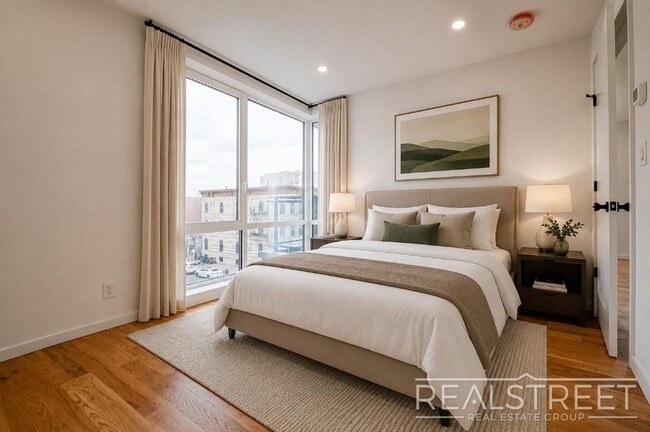 Photo - Light-Filled Corner 1BR with Private Outdoor Space & In-Unit Washer/Dryer Unit 4E
