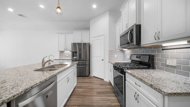Photo - Welcome home to this beautifully maintained 4-bedroom, 3-bath home in the desirable Fairwater com...