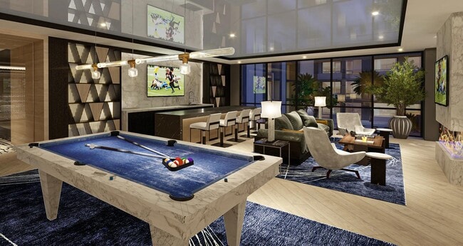 Expansive clubroom with wet bar, billiards, shuffleboard, and lounge areas. - Modera Kierland