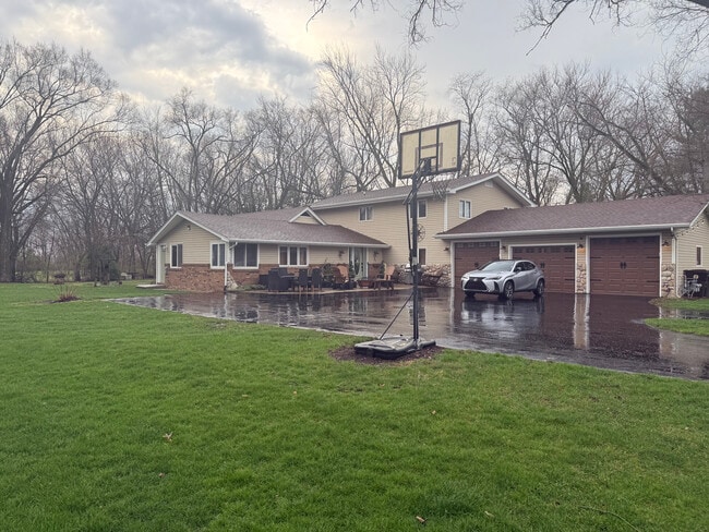 Side Door to Apartment - 11321 W 143rd Ave Unit Cornerstone Retreat