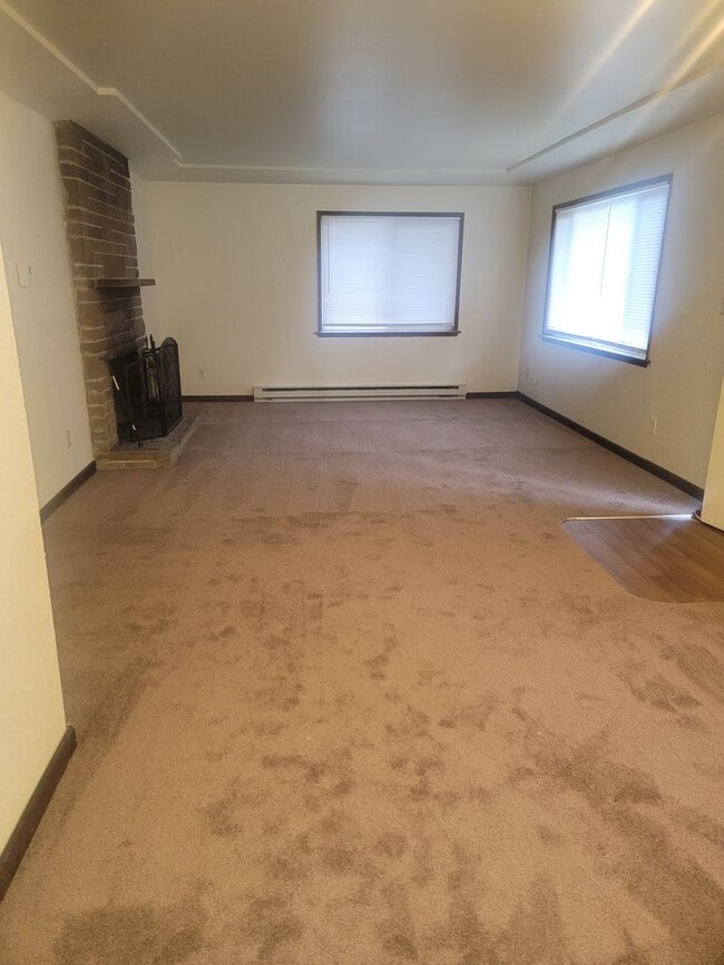 Photo - University Place 4 bedroom, 2 bath. Partially fenced yard