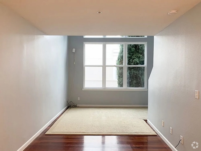 Building Photo - Modern loft-style condominium! Unit #13