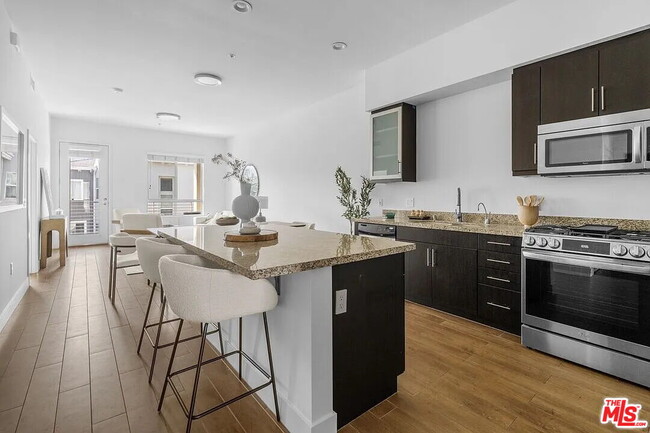 Building Photo - 12920 W Runway Rd Unit 342