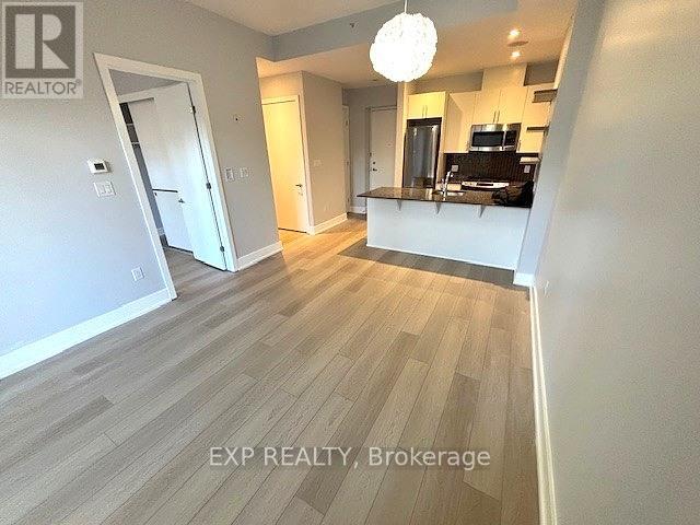 Photo - 100 Champagne Ave S Unité 210