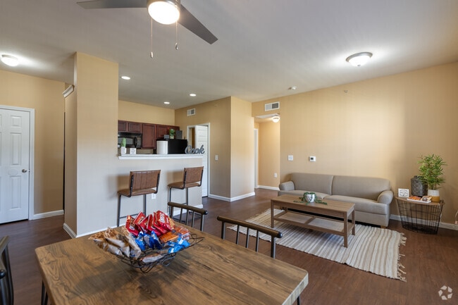 1BR, 1BA - 742SF - Living Room - Magnolia at Village Creek