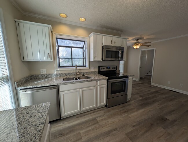 Photo - Gorgeous Brick 4 bedroom, 4 bathroom home located in the Farmwood community in Minthill!