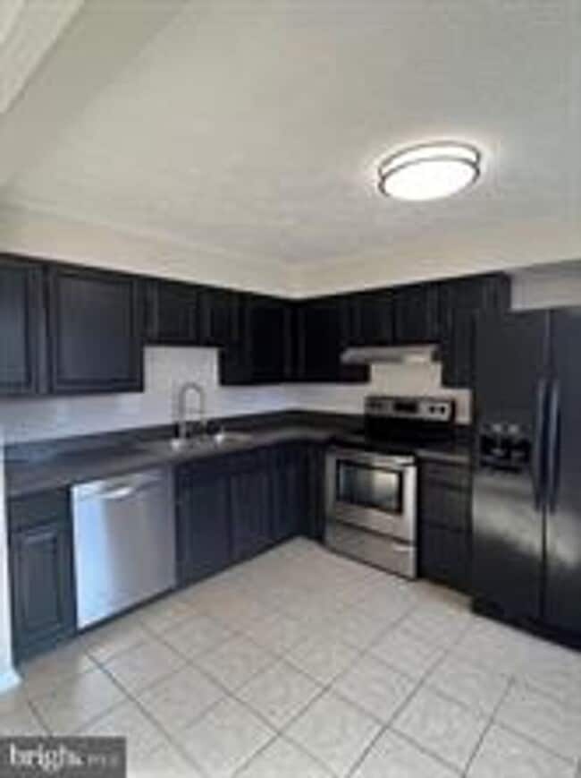 Photo - WELL MAINTAINED END UNIT TOWNHOUSE IN FARMBROOK