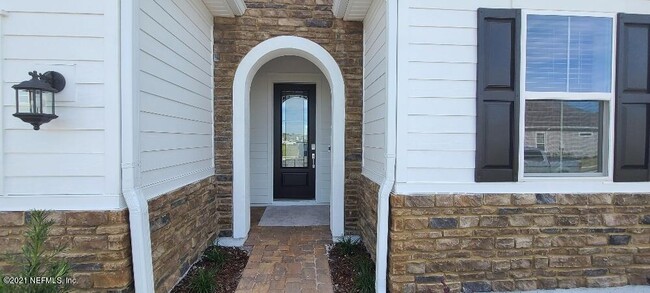 Building Photo - 4 bedroom home with 3 car garage In gated community