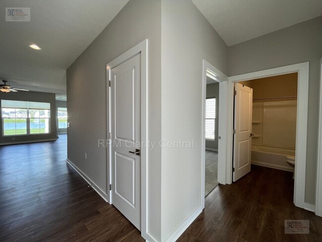 Photo - Beautiful 3BR Home with Pond Views, Modern Finishes & Low-Maintenance Living