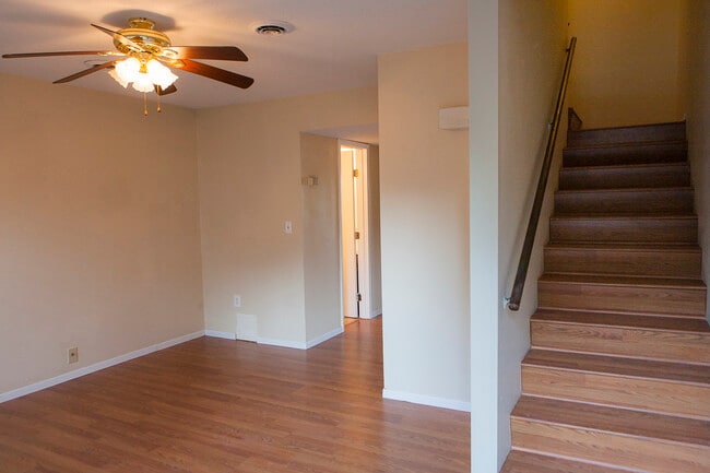Living room and staircase to second level - 1805 King College Rd Unit C7