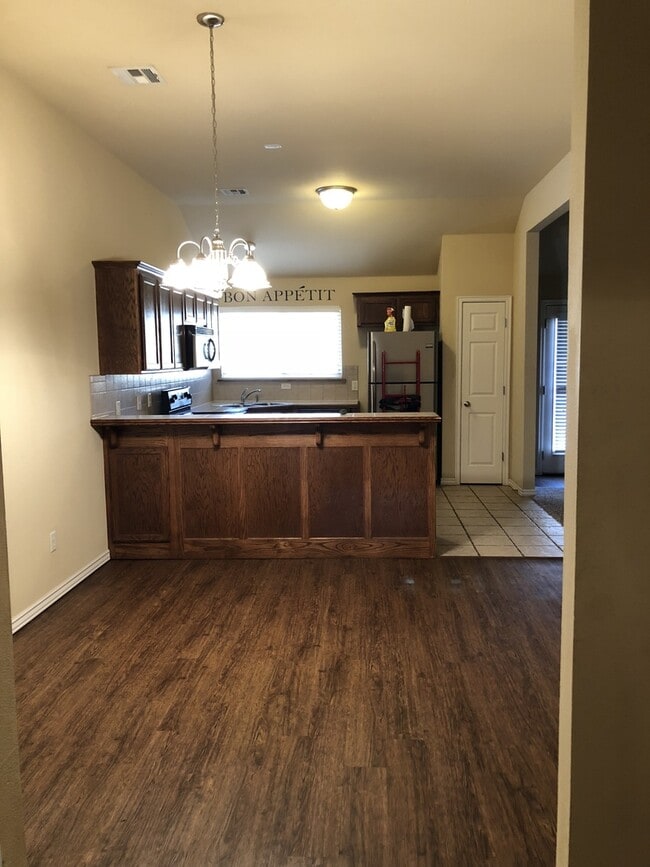 Photo - Two Living Areas!!! Spacious Three Bedroom Home in the Woodcreek Addition... Minutes from Campus,...