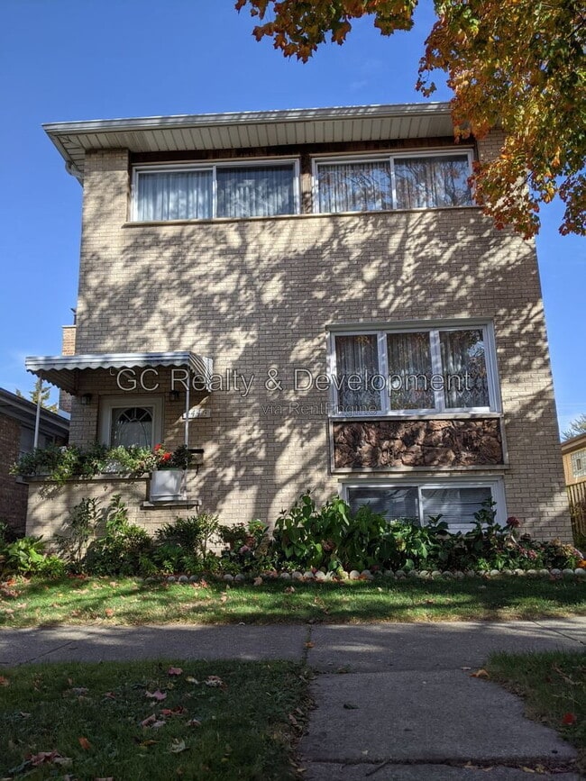 Building Photo - 4447 N Melvina Ave Unit 1
