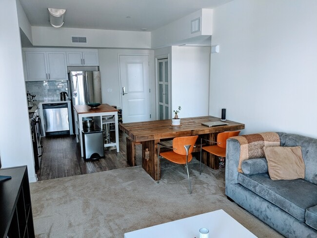 Partial Kitchen View from Living room - 12655 Bluff Creek Dr Unit 422