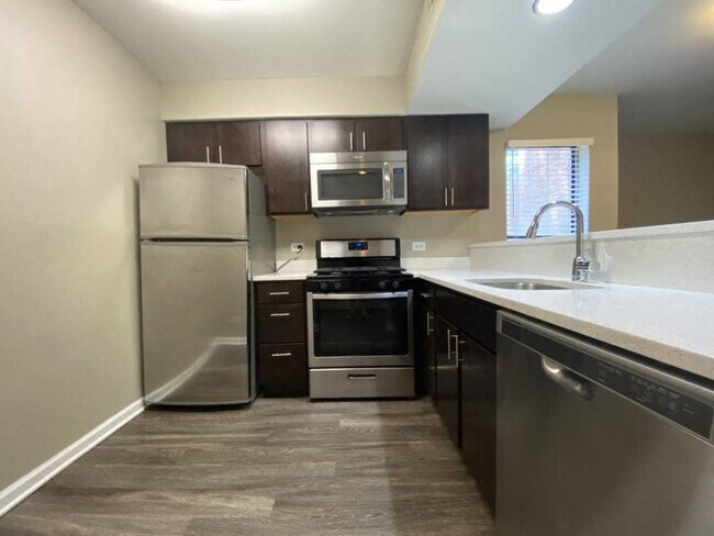 Stainless steel appliances with a built in microwave - 1801 North Dayton