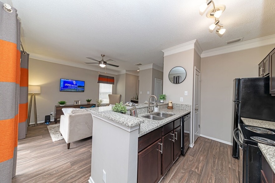Kitchen with granite counters and modern cabinetry