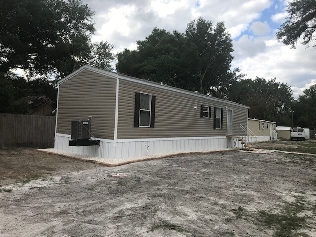Photo - Two-bedroom Home with Water, Garbage, and Lawncare Included