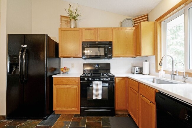Photo - Spacious 3-Bedroom with Walkout and Fully Fenced Yard in Eagan