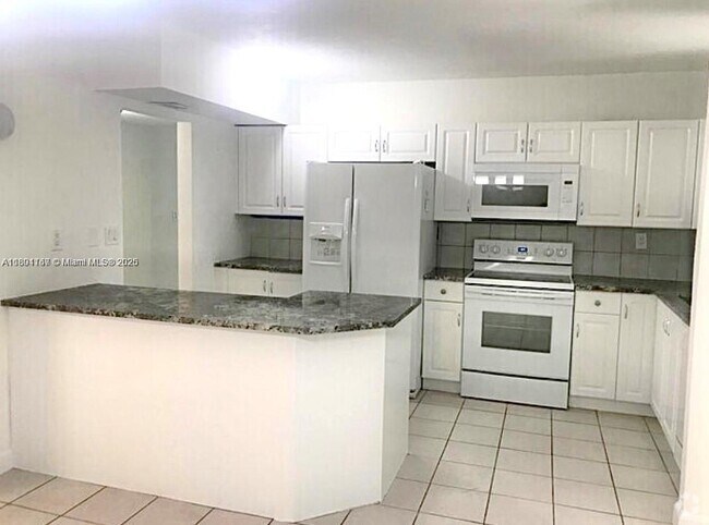 Building Photo - 20381 NE 30th Ave Unit 120-7 Rental