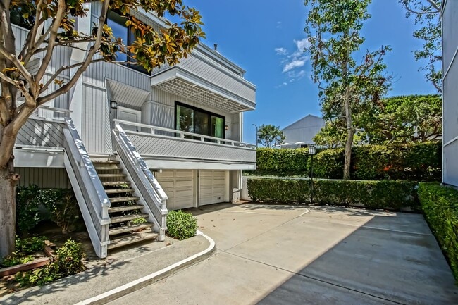 Building Photo - Remodeled, Bright & Airy End Unit Condo Overlooking Randall Preserve w/ Grand Entry Foyer, Open &...