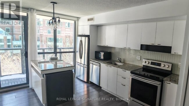 Photo - 110 Charles St E Unité 410