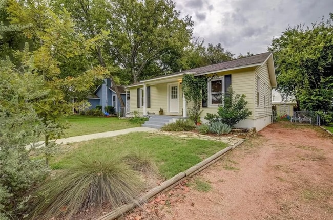 Building Photo - Discover Your Austin Oasis: Revitalized Bungalow with Hardwood Floors and Entertainer's Deck!