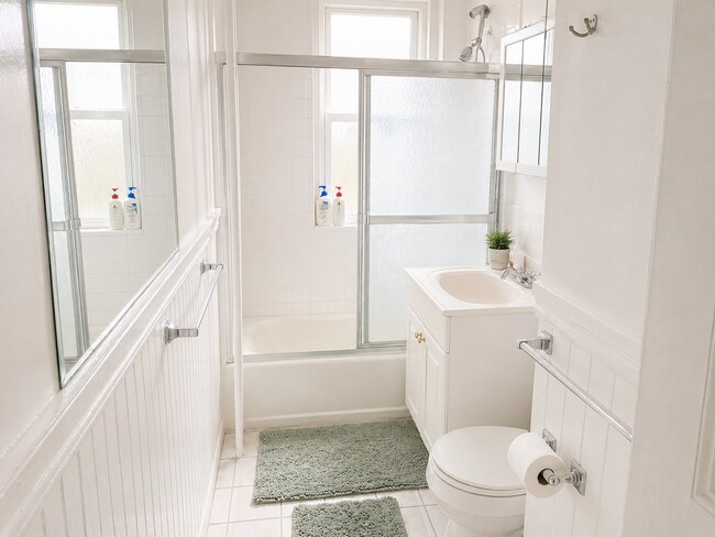 Building Photo - Sunlit Top-Floor Retreat: Charming 3-Bedroom in Coolidge Corner with Deck & Pet-Friendly! Laundry...