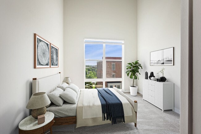 Retreat to your spacious, bright bedroom with lofty ceilings.
