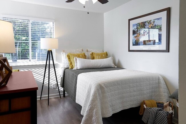 Sleep in comfort with spacious bedrooms and natural light at The Preserve at Tuscaloosa.