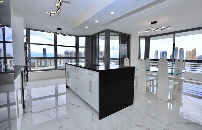 Building Photo - 3530 Mystic Pointe Dr Unit 2510