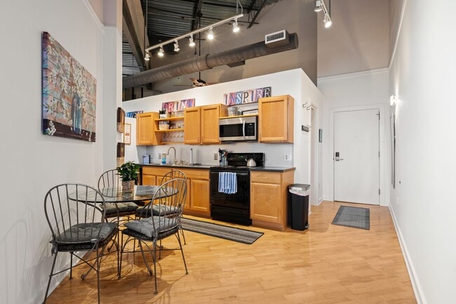 Photo - Furnished Top-Floor Condo with Rooftop Terrace Near UNC - Available NOW