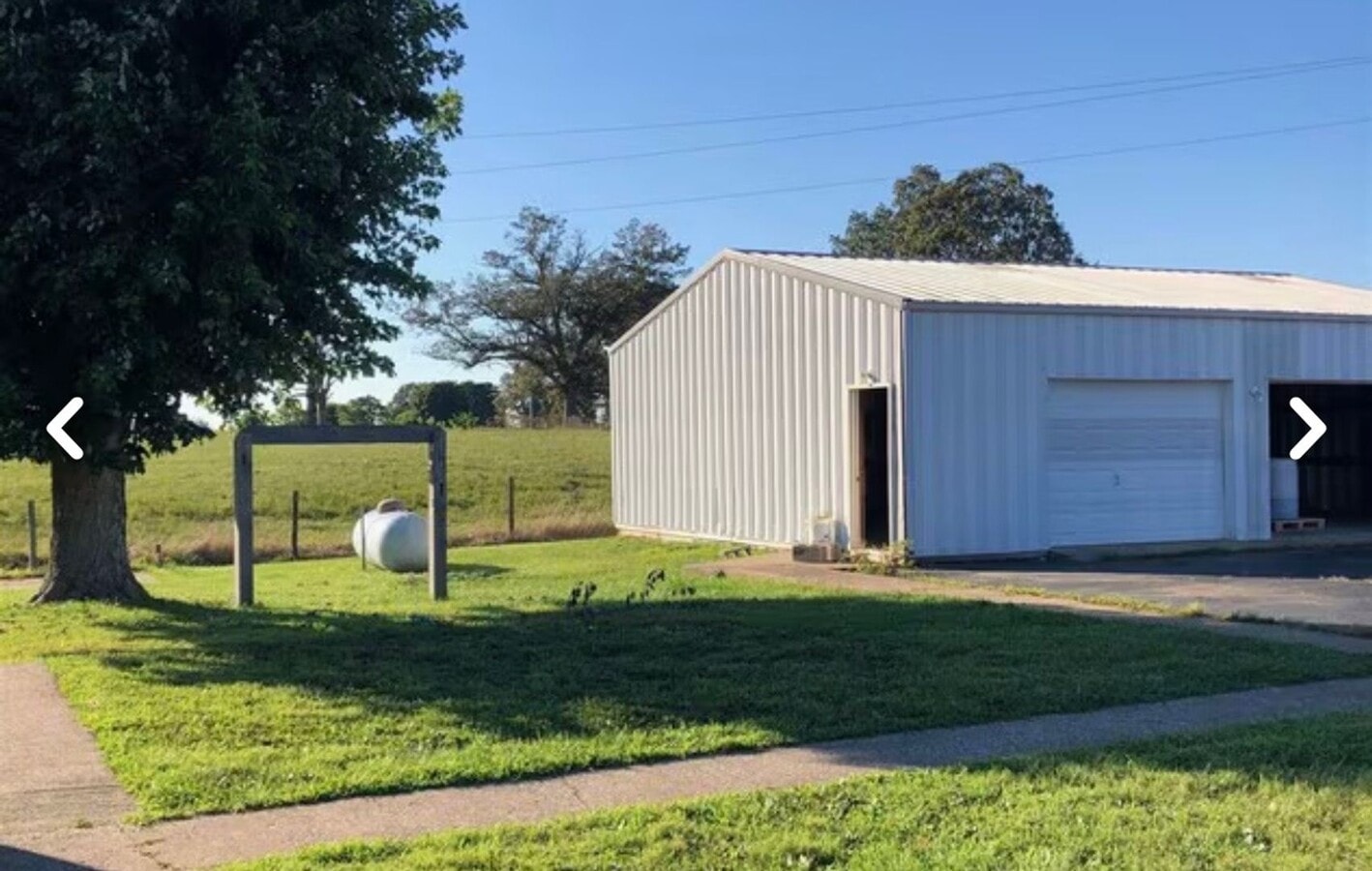 Photo - 3 Bed/2 Bad House with detached 2 car garage/shop