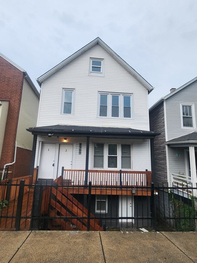 Building Photo - 8909 S Houston Ave Unit 2