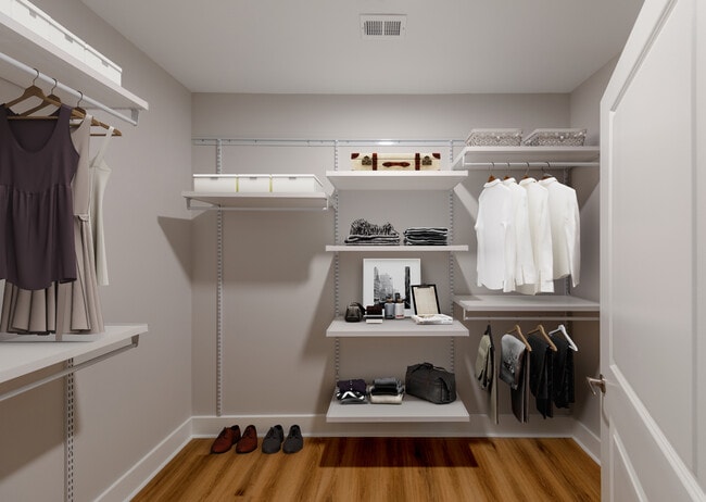 Penthouse-level Signature Collection apartment home walk-in closet with customizable shelf system