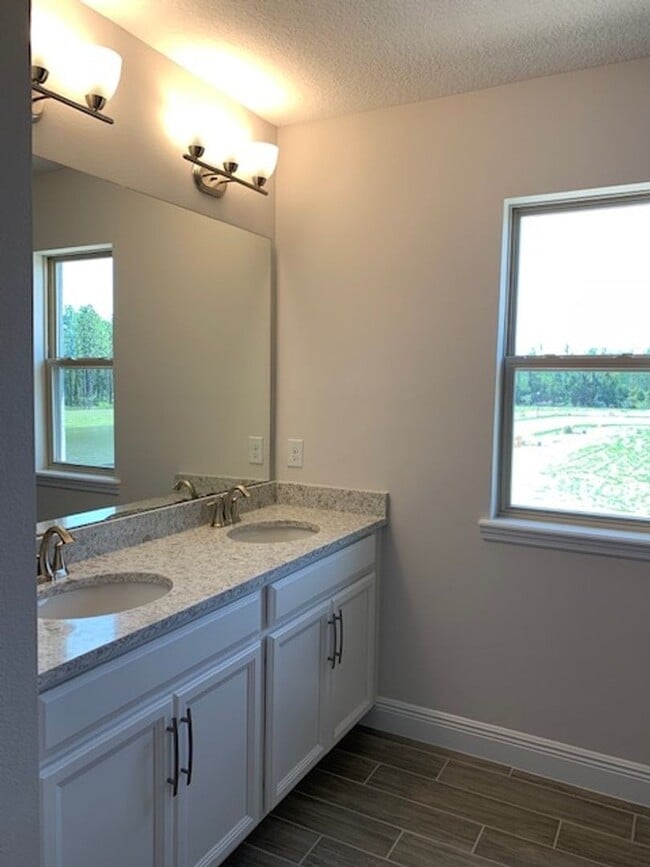 Photo - SPECTACULAR MODERN HOME!!Relaxing water views from the back of this beautiful home- MOVE IN Septe...