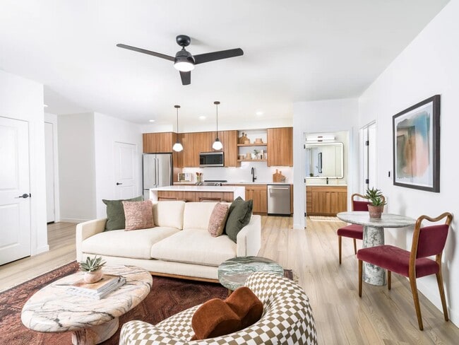 Open-concept living with warm tones, sleek finishes, and space to stretch out—plus multiple finish options to match your personal style. - Modera Higley Commons