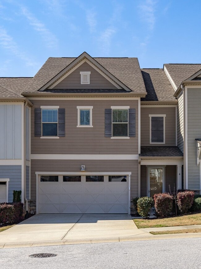 Photo - **MOVE IN SPECIAL! 50% off first month's rent!!** Spacious 4BR Townhouse with 2-Car Garage Near D...