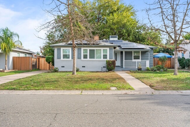 Photo - Charming 3-Bedroom Bungalow with Solar and 2-Car Garage