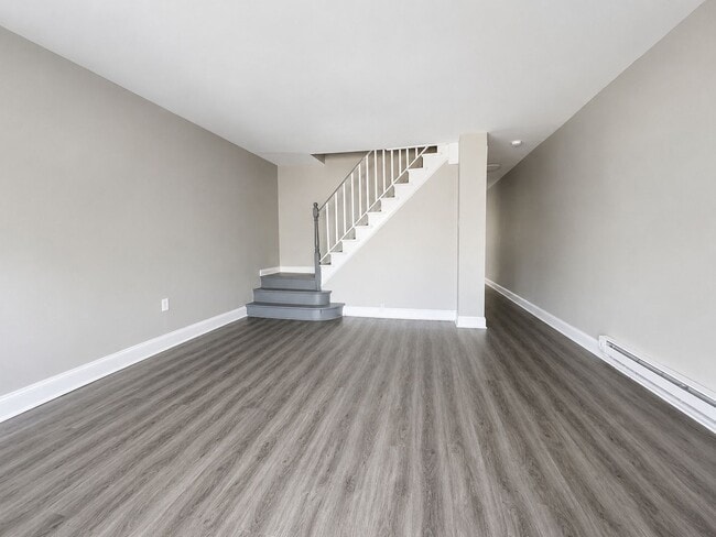 Photo - Spacious 3-Bedroom Rental with Front Porch, Backyard & Basement