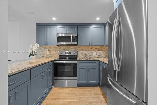 Building Photo - 16851 NE 23rd Ave Unit A107