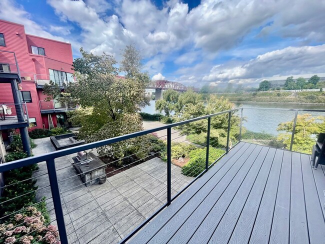 Photo - Top-Floor Riverfront Living with Broadway Bridge Views | 2 Bed + 2 Bath + Parking