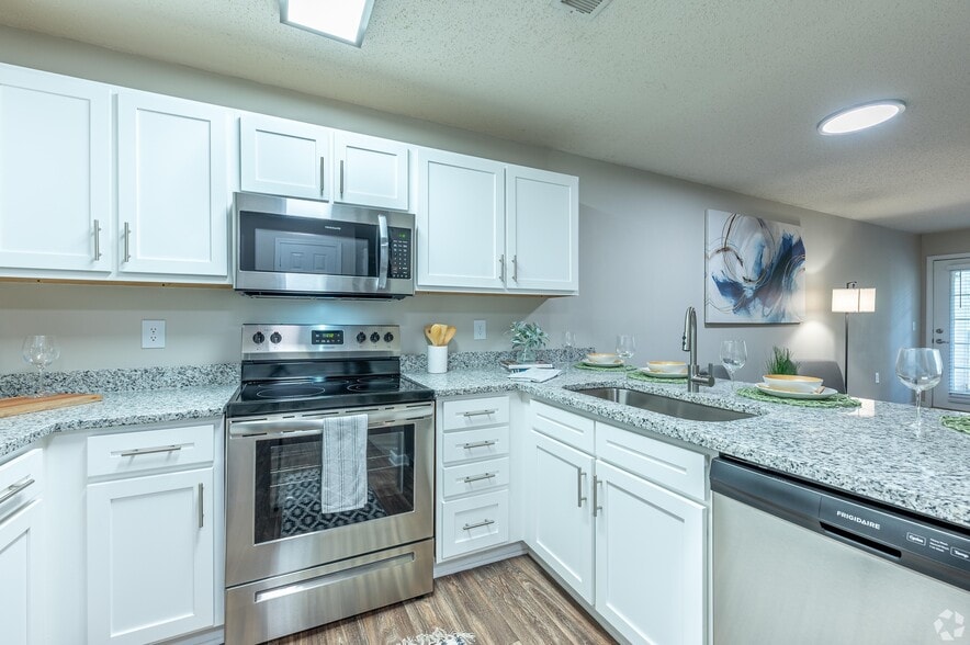 Kitchen with granite counters and stainless appliances