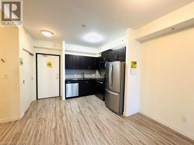 Photo - 128 King St N Unité 1006