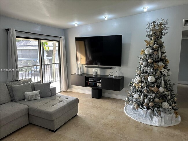 Building Photo - 9729 Hammocks Blvd Unit 207E