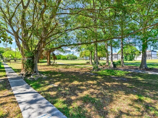 Building Photo - 8401 Lagos De Campo Blvd Unit 210V
