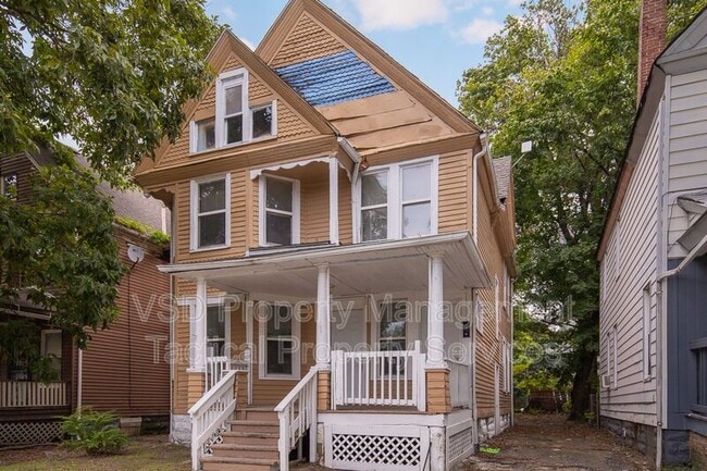 Building Photo - 1583 E 84th St Unit Up