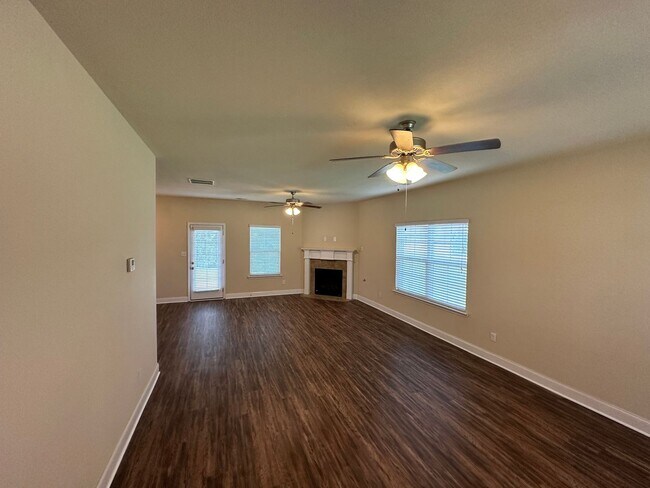 Photo - Available NOW! 4 BR/ 2.5 BA- All new flooring and paint! New PRIVACY FENCE being installed!