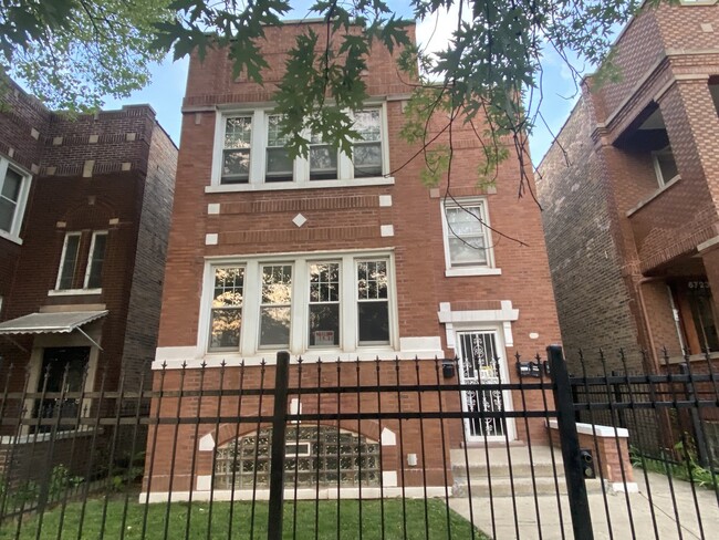 Building Photo - 6721 S Maplewood Ave Unit 1 Rental