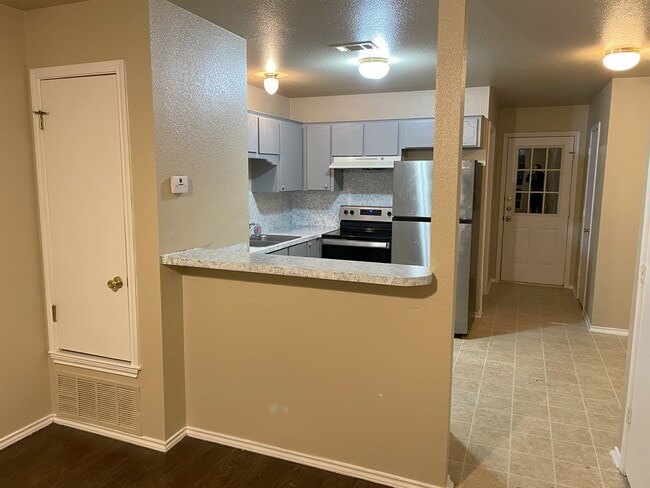 Kitchen from Living Room - 4302 Jeff Scott Dr Apartments