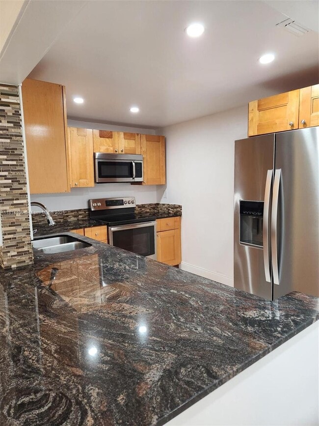 Building Photo - 4384 NW 9th Ave Unit 19-1D Rental