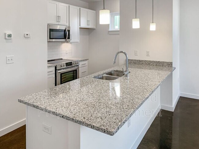 Photo - 116 W 12th St E Unit A